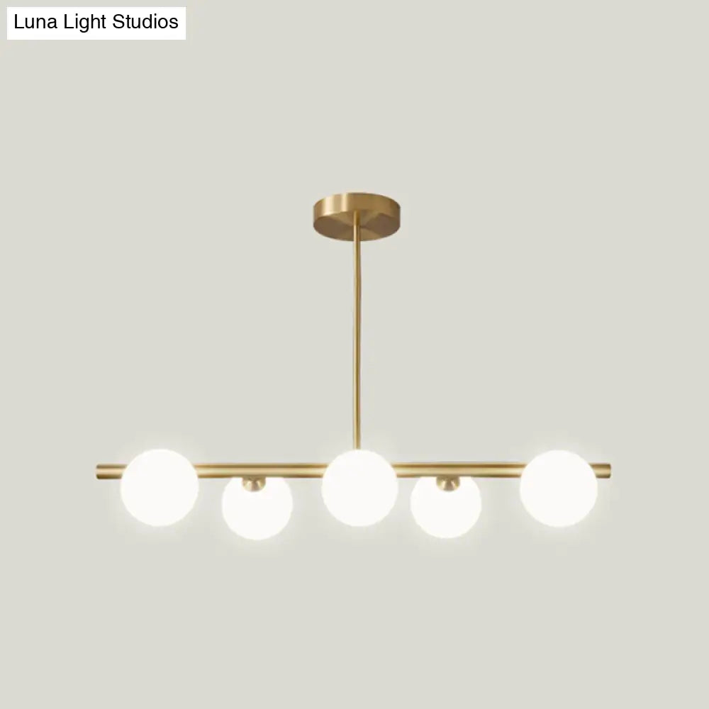 DecorBites™ Gold Linear Island Pendant Light with Spherical Glass Shade - Perfect for Dining Table and Minimalist Decor