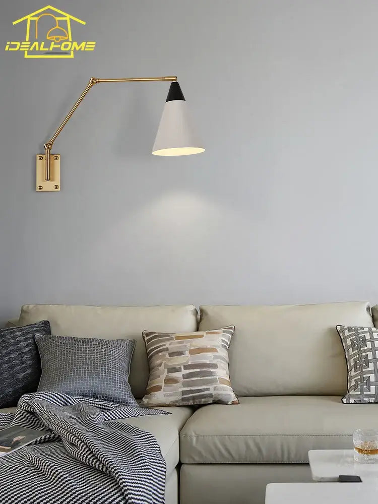 Gold lustre brass swing arm wall lamp for bedroom with white shade