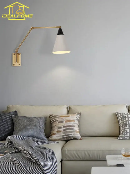 Gold lustre brass swing arm wall lamp for bedroom with white shade