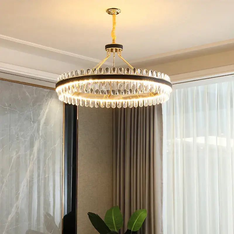 Gold stainless steel crystal chandelier dining room leather detail