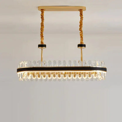 Gold stainless steel crystal chandelier dining room leather detail
