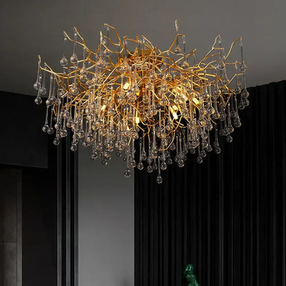 Gold tree branch chandelier with crystal droplets for dining room