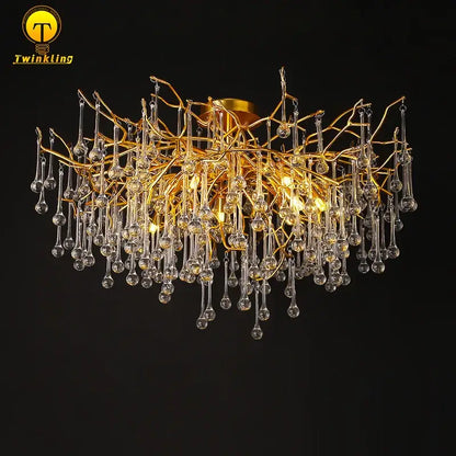 Gold tree branch chandelier with crystal droplets for dining room