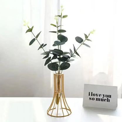 Modern gold vase with eucalyptus branches desk decoration office