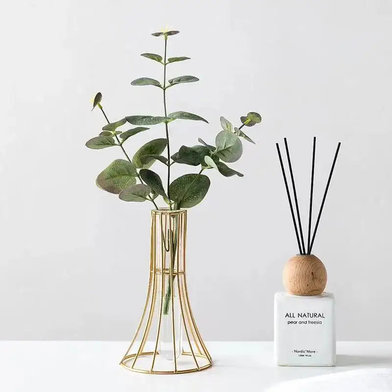 Modern gold vase with eucalyptus branches desk decoration office
