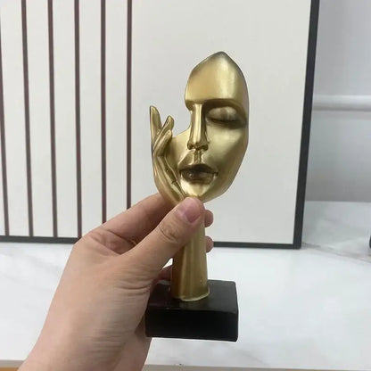 Golden abstract mask statue for home office decor