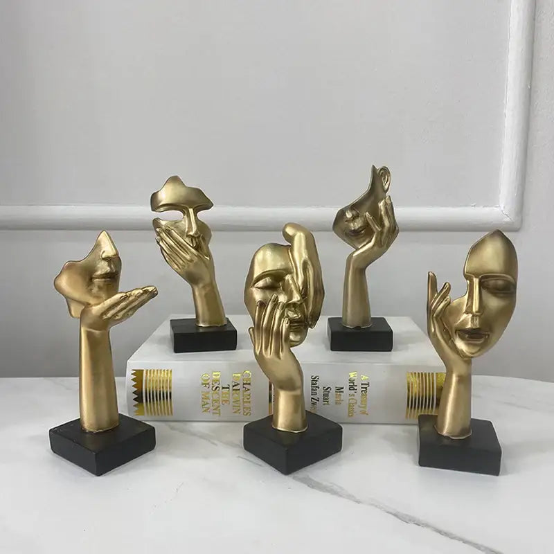 Golden abstract mask statue for home office decor