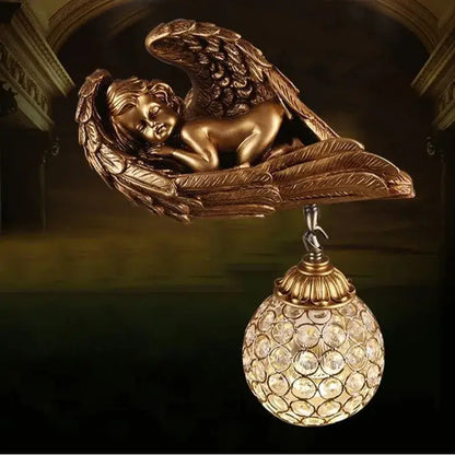 Golden angel wall lamp with crystal globe for living room