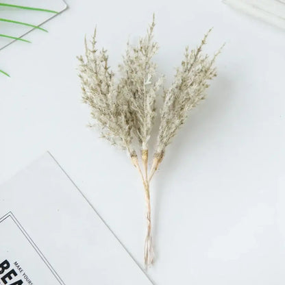 Golden artificial autumn branches set living room decor