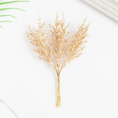 Golden artificial autumn branches set living room decor