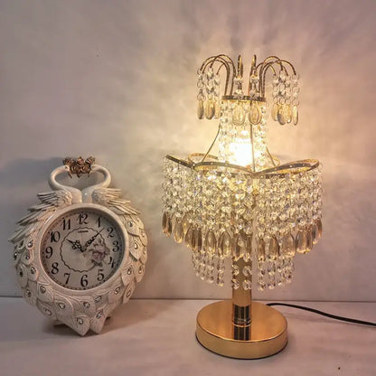Golden crystal table lamp with teardrop accents for bedroom decor