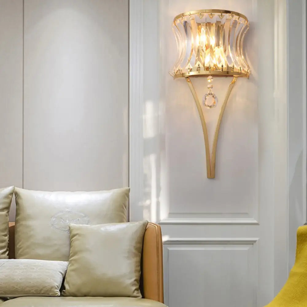 DecorBites™ Golden Curved Metal Wall Sconce with Clear Crystal Prism