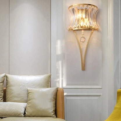 DecorBites™ Golden Curved Metal Wall Sconce with Clear Crystal Prism