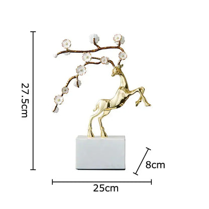 Golden deer antlers statue with white blossoms living room decor