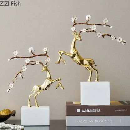 Golden deer antlers statue with white blossoms living room decor