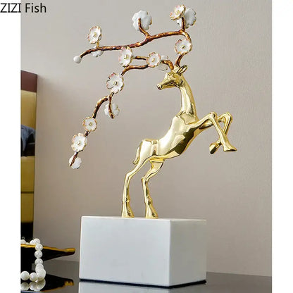 Golden deer antlers statue with white blossoms living room decor