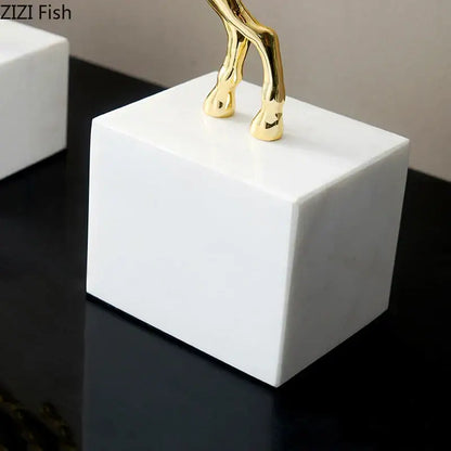 Golden deer antlers statue with white blossoms living room decor