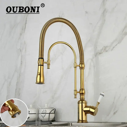 Golden kitchen faucet with white ceramic handle and swivel spout
