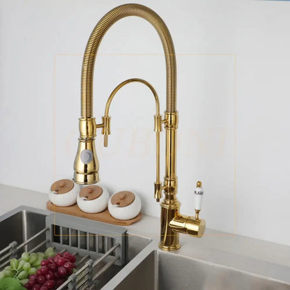 Golden kitchen faucet with white ceramic handle and swivel spout