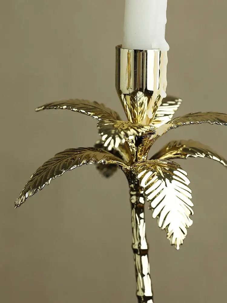 Golden metal candlestick palm tree with marble base dining room decor