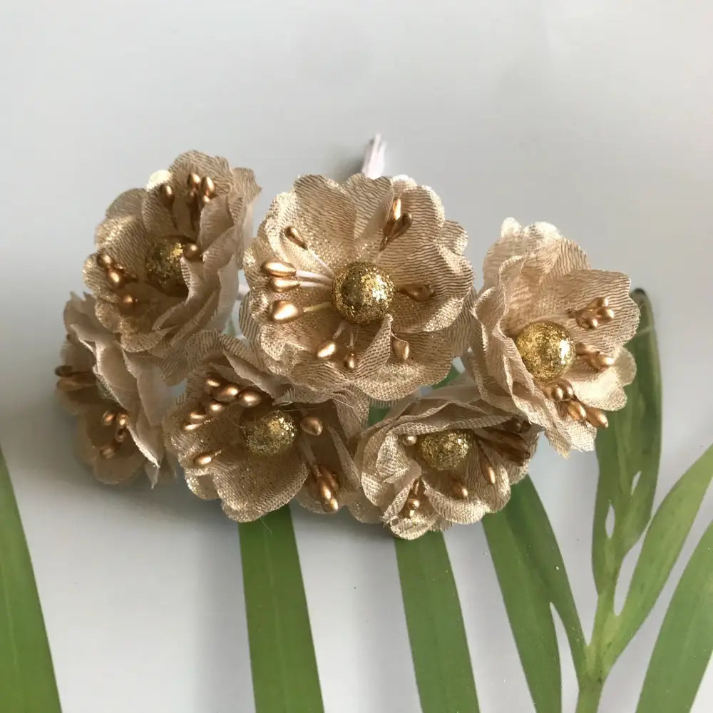Golden metallic berry stamen green plant foliage for living room decor