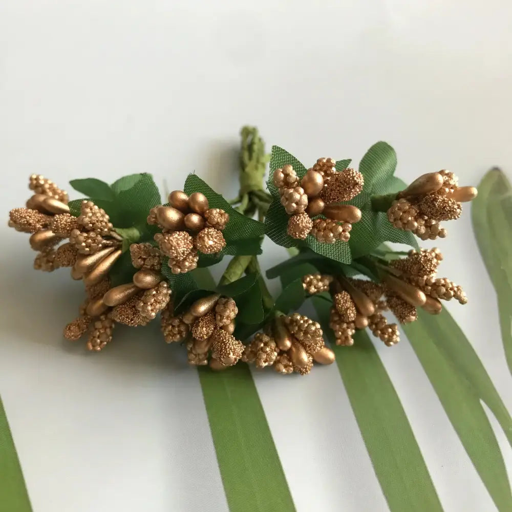Golden metallic berry stamen green plant foliage for living room decor