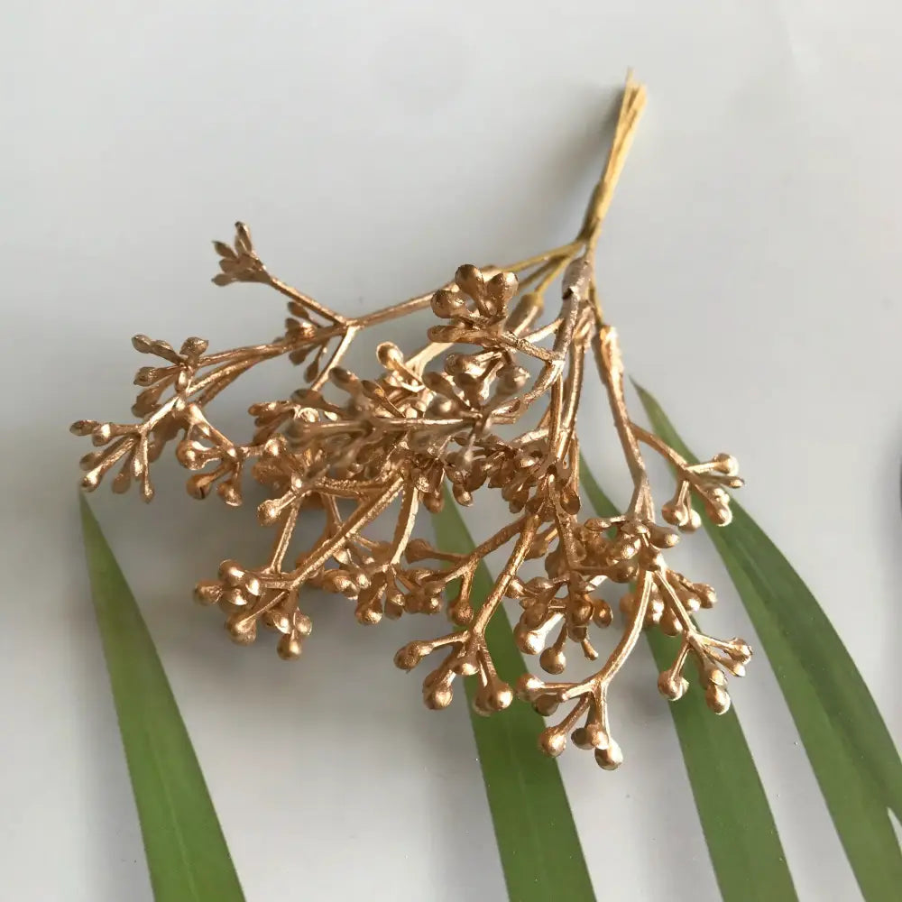 Golden metallic berry stamen green plant foliage for living room decor