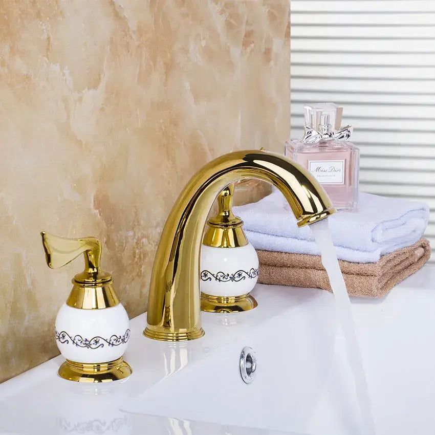 Golden plated bathroom faucet set with white ceramic handles