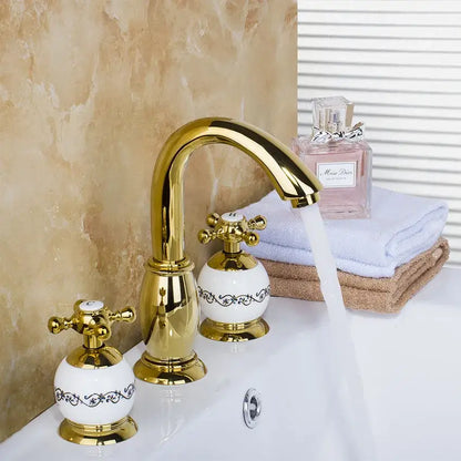 Golden plated bathroom faucet set with white ceramic handles