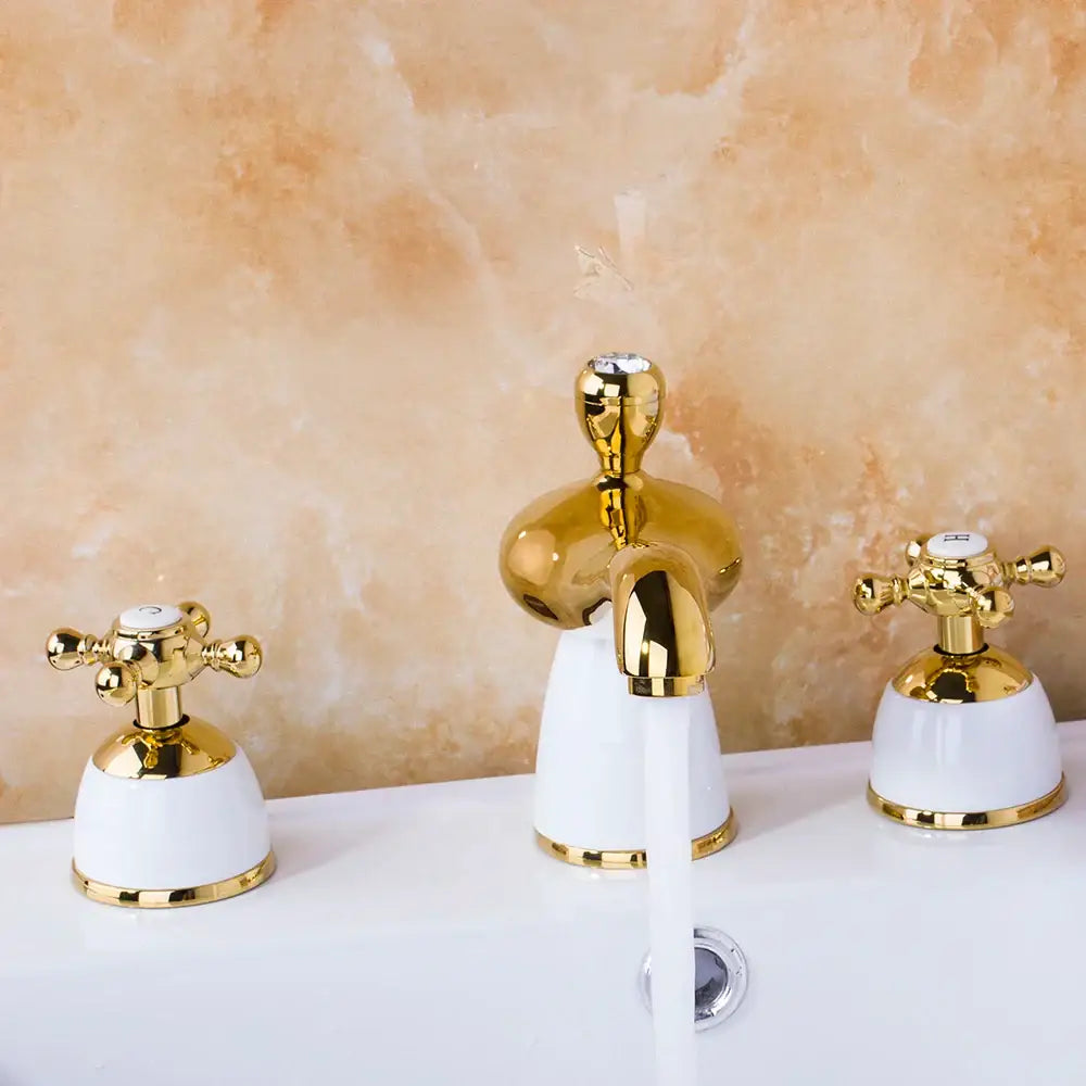 Golden plated bathroom faucet set with white ceramic handles