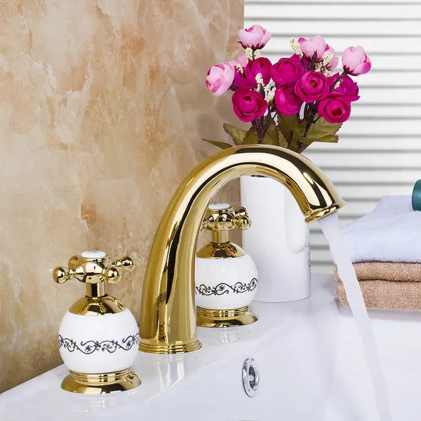 Golden plated bathroom faucet set with white ceramic handles