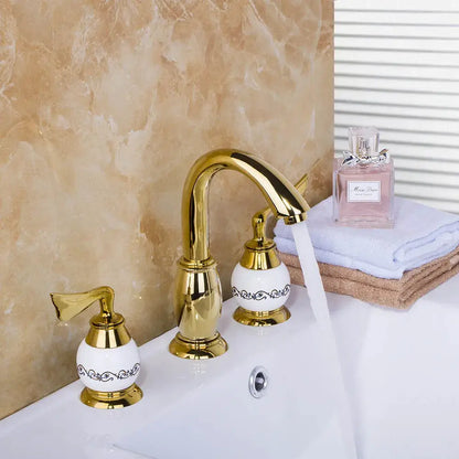 Golden plated bathroom faucet set with white ceramic handles