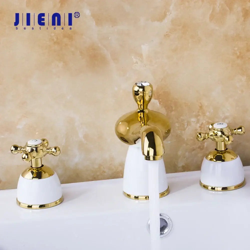 Golden plated bathroom faucet set with white ceramic handles