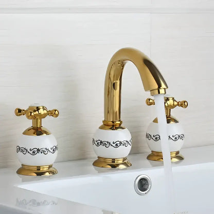 Golden plated bathroom faucet set with white ceramic handles