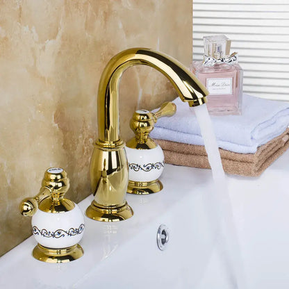 Golden plated bathroom faucet set with white ceramic handles