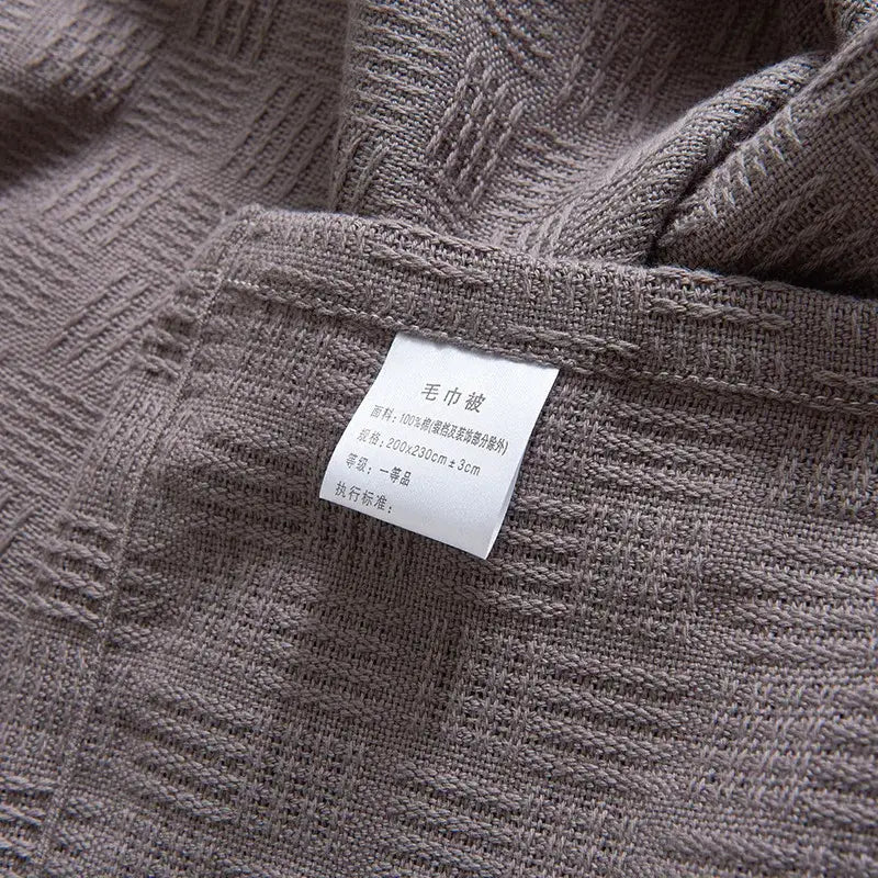 Gray herringbone cotton waffle towel quilt for bedroom or office