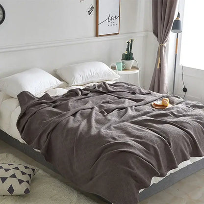 Gray herringbone cotton waffle towel quilt for bedroom or office
