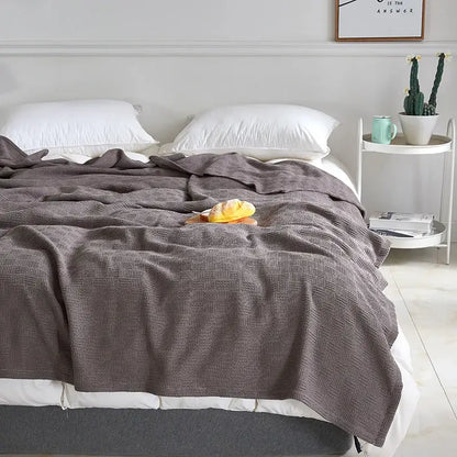 Gray herringbone cotton waffle towel quilt for bedroom or office