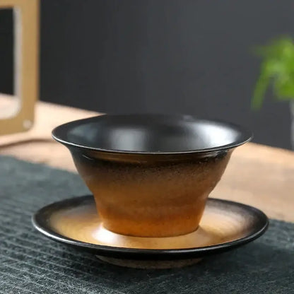 Handcrafted brown & amber ceramic latte coffee cup and saucer dining room
