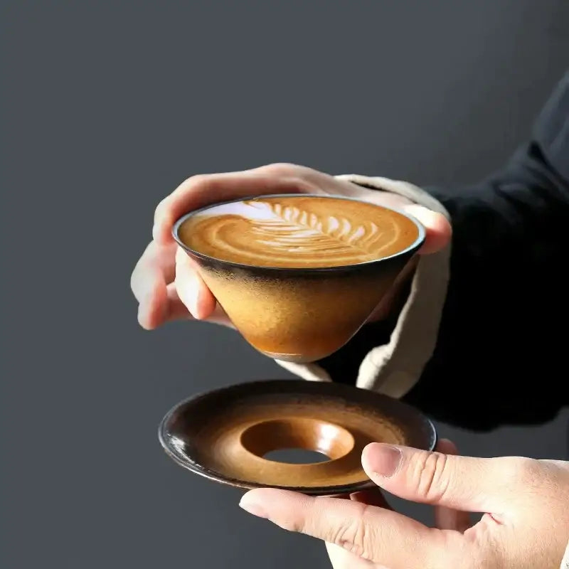 Handcrafted brown & amber ceramic latte coffee cup and saucer dining room