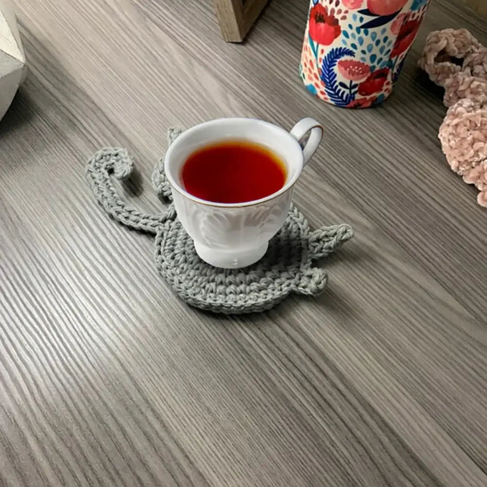 Handmade gray crocheted cat butt coasters dining room decor set of 4