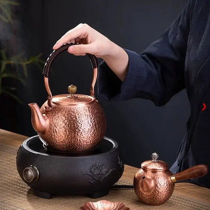 Handmade hammered copper tea pot with knitting handle dining room set