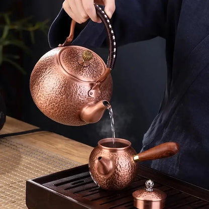 Handmade hammered copper tea pot with knitting handle dining room set