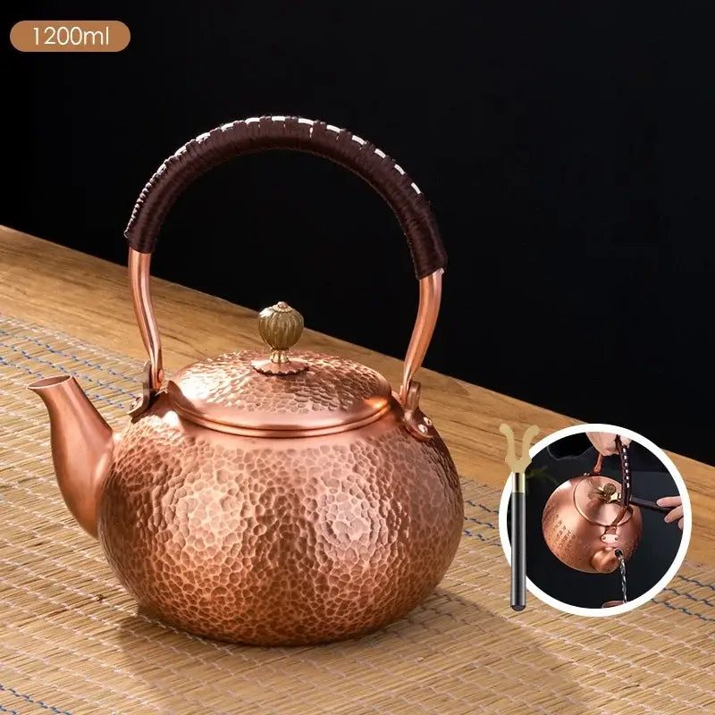 Handmade hammered copper tea pot with knitting handle dining room set