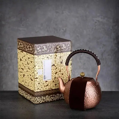 Handmade hammered copper tea pot with knitting handle dining room set