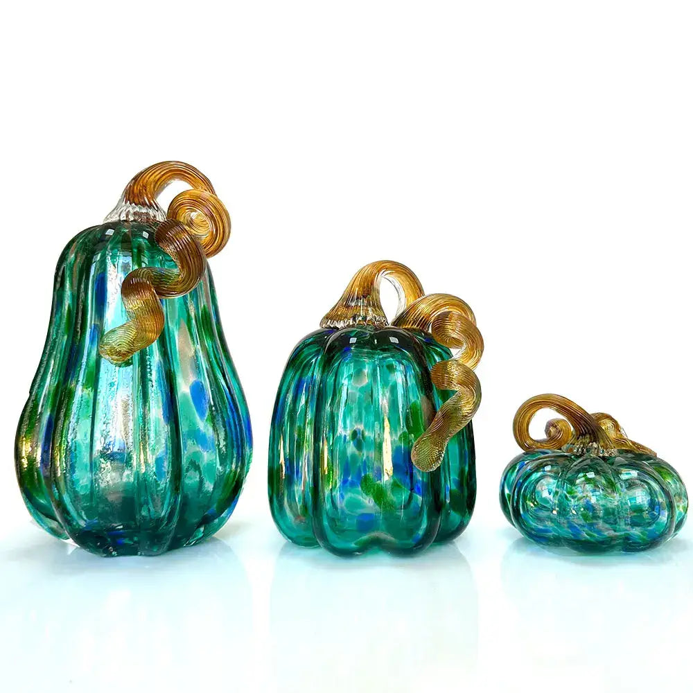 Handmade iridescent teal & green glass pumpkin figurines living room
