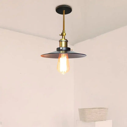 Industrial adjustable wall light for kitchen brass and black sconce