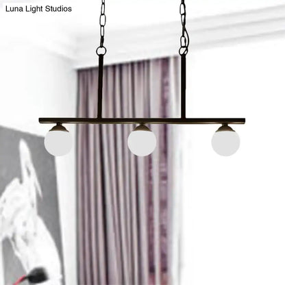 Industrial black 3-light opal glass globe pendant – dining room