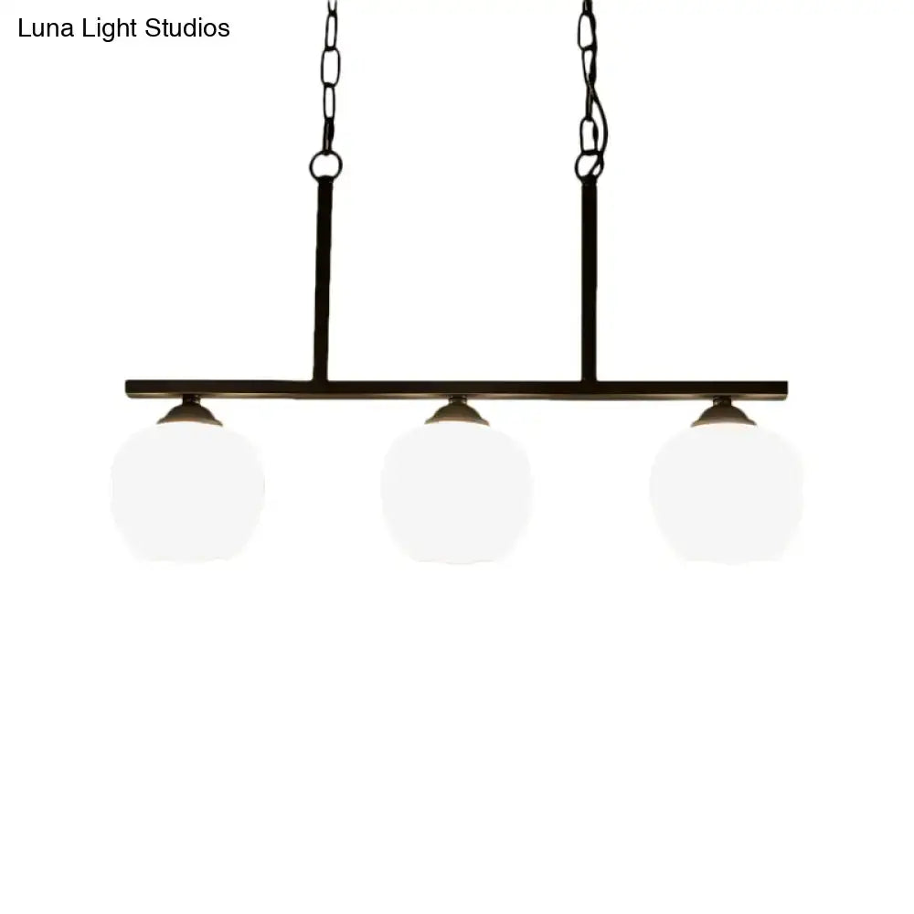 Industrial black 3-light opal glass globe pendant – dining room