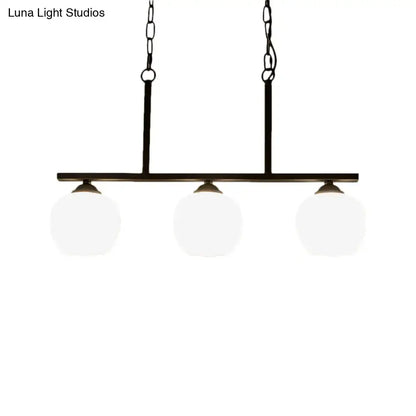 Industrial black 3-light opal glass globe pendant – dining room